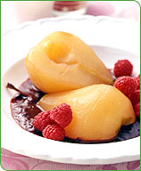 Photo of Poached pears with chocolate-cranberry sauce by WW