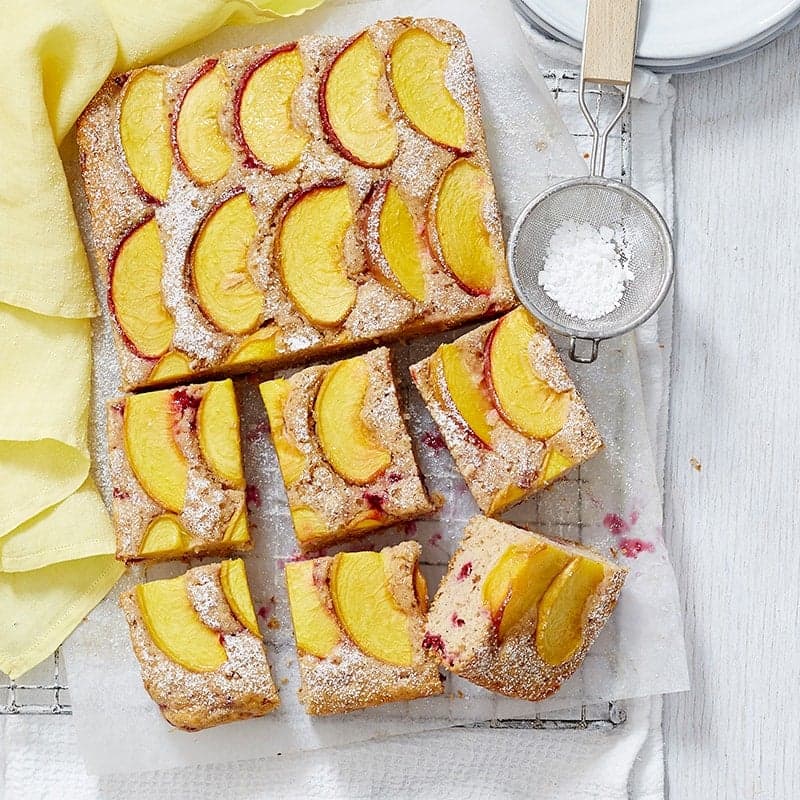 Peach, almond and raspberry tray cake