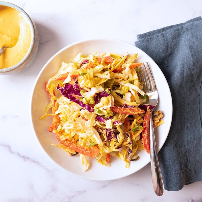 Vegan cabbage salad with carrot-ginger dressing